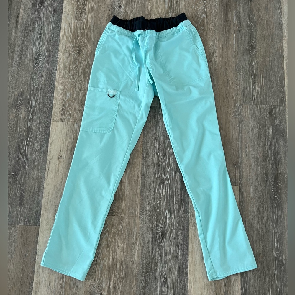 Light turquoise blue Cherokee uniform scrub pants size XS.